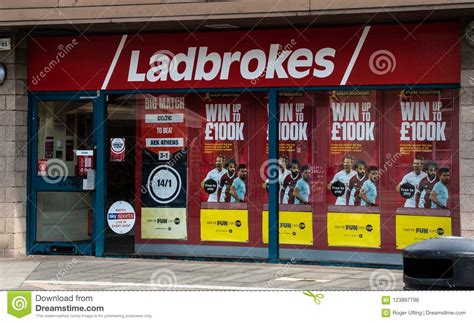 Desmond cashes in as Ladbrokes buys bookies .